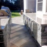 Outdoor kitchen and seating area