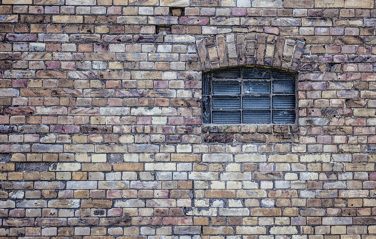 Masonry Foundation Specialist brick wall with window